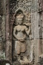 Carvings of Mrs. Apsara at Tasom Temple