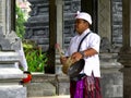 TABANAN, INDONESIA- JUNE, 16 2017: close up of a gong player at ulun danu beratan temple Royalty Free Stock Photo