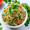 Tabbouleh salad with bulgur, tomatoes and parsley.