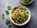 Tabbouleh salad with couscous, tomatoes, olive oil and parsley.