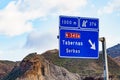 Tabernas desert landscape and road sign, Spain Royalty Free Stock Photo