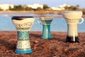 Tabla or darbuka, egyptian music instrument, beach background Royalty Free Stock Photo