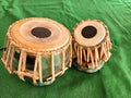 tabla musical instrument keep on green background