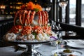 A table is adorned with a cake that is covered in intricately crafted lobsters, Opulent seafood tower topped with Alaskan king