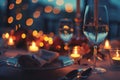 A table adorned with a glass of wine and a plate of food, A romantic dinner setting with candlelight Royalty Free Stock Photo