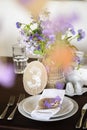 Table appointments and decor with flowers, number Royalty Free Stock Photo