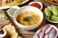 Table With Assorted Bowls of Soup and Fresh Vegetables Royalty Free Stock Photo