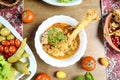 Table With Assorted Plates of Food and Bowls of Vegetables Royalty Free Stock Photo