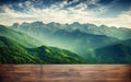 table background of free space for your decoration and blurred landscape of mountains.Blue sky with sun light and green Royalty Free Stock Photo