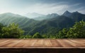 table background of free space for your decoration and blurred landscape of mountains.Blue sky with sun light and green Royalty Free Stock Photo