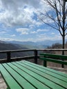 table background of free space for your decoration and blurred landscape of mountains.Blue sky with sun light and green Royalty Free Stock Photo