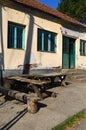 Table and bench in front of the shops