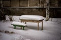 Table and benches under the snow Royalty Free Stock Photo