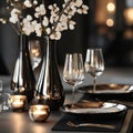 A table with a black tablecloth and a black plate with a wine glass and a fork Royalty Free Stock Photo