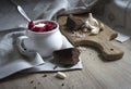 On the table a blue napkin with ornament pattern and soup tureen with red beet soup on the sun bread garlic sour cream Royalty Free Stock Photo