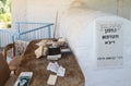 The table with books near the tombstone in the reconstructed tomb Rabbi Nakhman Katufa near the kibbutz Baram in Western Galilee i