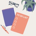 Table with boxes for completed tasks. Case sheet. A complete to-do list with goals and objectives. Notepad pen glasses houseplant Royalty Free Stock Photo