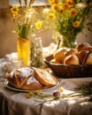 a table with bread and two baskets filled with eggs and flowers Royalty Free Stock Photo