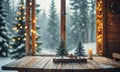A table with a candle on it and two Christmas trees in front of the window. Royalty Free Stock Photo