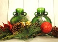 Tabletop Christmas decoration, two glass vases, pine cones, Christmas balls, Royalty Free Stock Photo