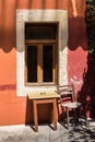 Table and chair on the street, Archanes, Crete, Greece
