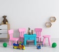 Table and chair in white child room for mockup, 3D rendering Royalty Free Stock Photo