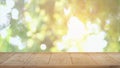 Table and Chair, Wood table bar and nature tree bokeh blurred background at morning time and beautiful nature sun light, Top wood Royalty Free Stock Photo