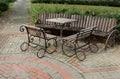 Table and chairs in the autumn park. Street cafe without visitors Royalty Free Stock Photo