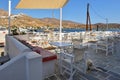 Table and chairs with sea view. Serifos Island. Greece Royalty Free Stock Photo