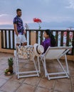 Table and chairs with breakfast during sunrise at the meditarian sea in Greece Royalty Free Stock Photo