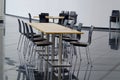 Table and chairs at cafeteria seating area Royalty Free Stock Photo