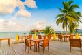 Table and chairs at restaurant in tropical Maldives island . Royalty Free Stock Photo