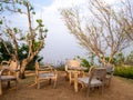 Table and chairs  on a lawn at the garden Royalty Free Stock Photo