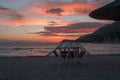 Table and chairs at sunset in Corfu island Royalty Free Stock Photo