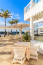 Table with chairs on terrace in Puerto Calero marina Royalty Free Stock Photo