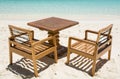 Table with chairs at the tropical beach at Maldives