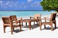 Table and chairs at tropical beach restaurant, Maldives Royalty Free Stock Photo