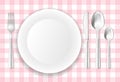 Table-cloth, porcelain plate and stainless cutlery Royalty Free Stock Photo