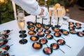 Wedding table with glass objects and a lot of cold snacks on buffet table, catering Royalty Free Stock Photo
