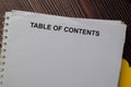 Table of Contents write on a paperwork isolated on wooden table Royalty Free Stock Photo