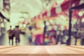 Table, counter at store, background for product display template, Empty wood desk, shelf, counter over blur retail shop Royalty Free Stock Photo