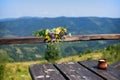 Table with cup of coffee in the mountains