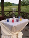 Table and cups of sand for a ceremony Royalty Free Stock Photo