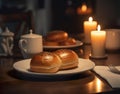 Table decorated with candles, plant and filled with sweets and desserts.