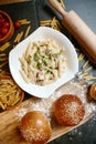 Table Decorated With Hamburgers and Pasta