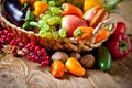 The table, decorated with vegetables and fruits. Harvest Festival. Happy Thanksgiving. Autumn background. Selective Royalty Free Stock Photo
