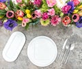 Table decoration colorful spring flowers Holidays place setting Royalty Free Stock Photo