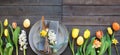 Table decoration with tulips and easter eggs Royalty Free Stock Photo