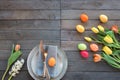 Table decoration with tulips and easter eggs Royalty Free Stock Photo