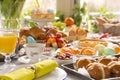 Table with delicatessen ready for Easter brunch Royalty Free Stock Photo